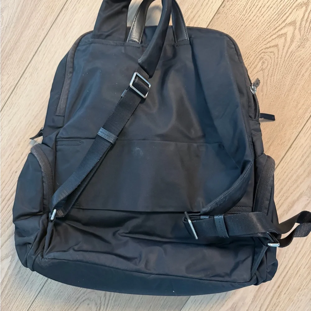 Tumi Black Nylon Backpack with Front Zip Pockets